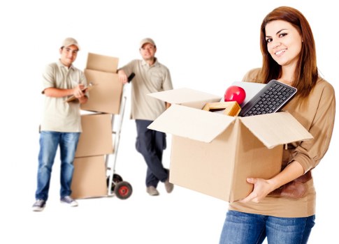 Team carrying furniture during local removals in Limehouse