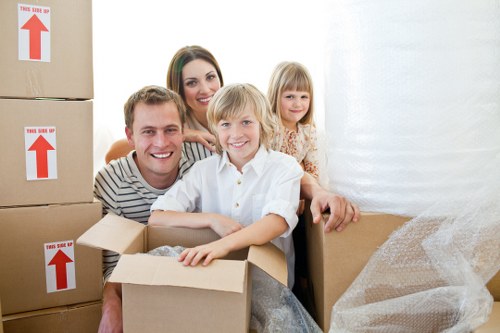 Local moving service near Limehouse riverside buildings